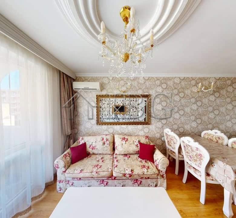 Bright living room with elegant decor and ample natural light in Sunny Beach.