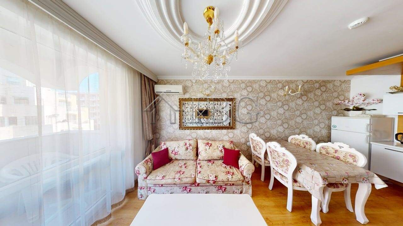 Bright living room with elegant decor and ample natural light in Sunny Beach.