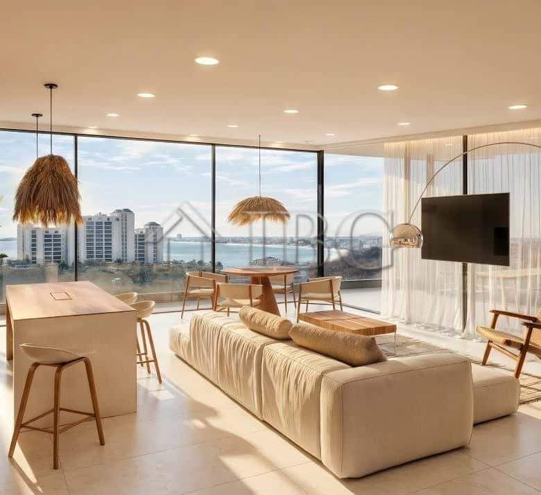 Spacious modern living room with panoramic sea views, stylish furniture, and natural light in Loggia.