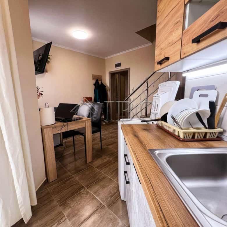 Bright 1-bedroom apartment with pool view in Sunny Beach, featuring modern kitchen and comfortable l.