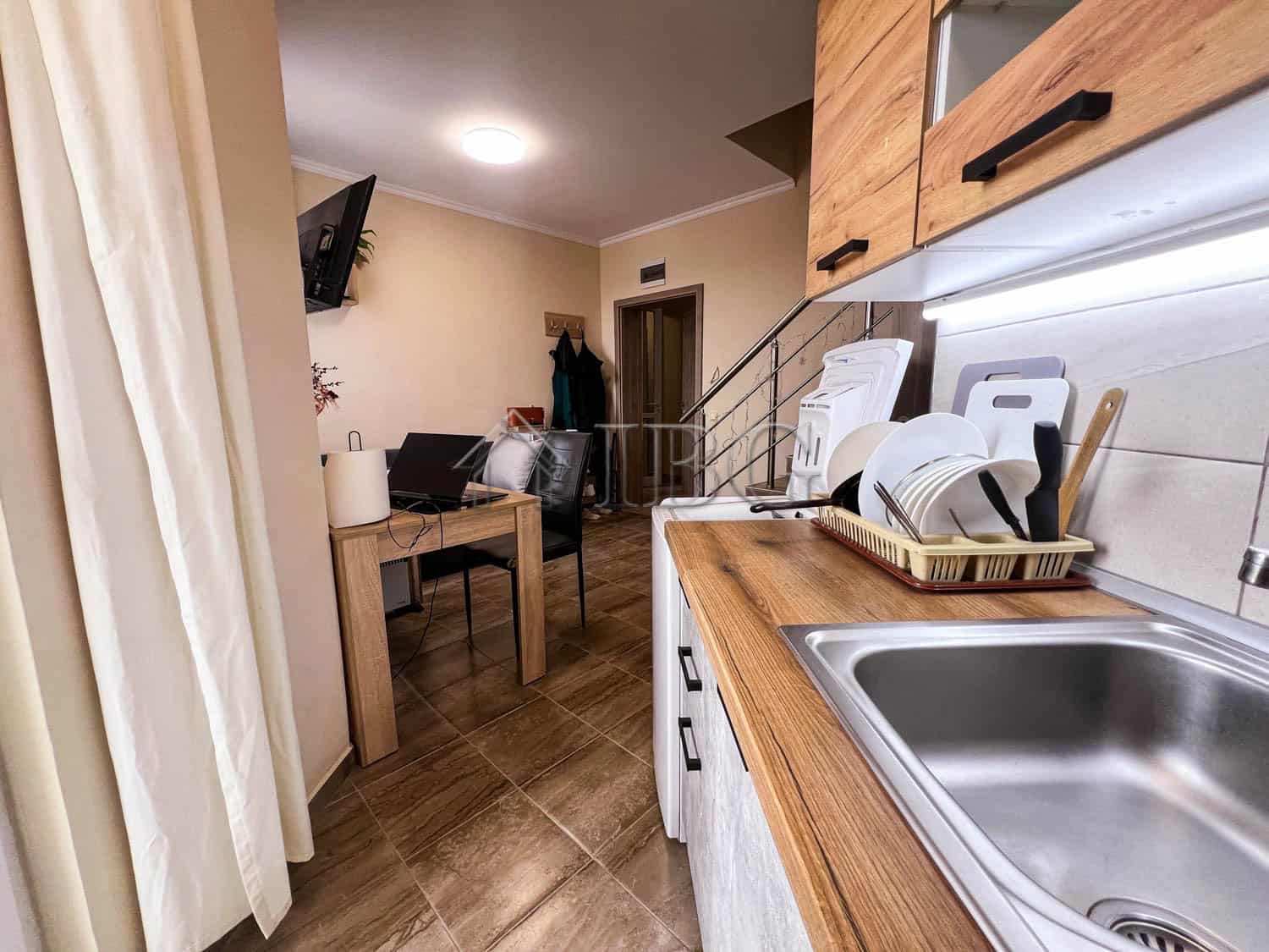 Bright 1-bedroom apartment with pool view in Sunny Beach, featuring modern kitchen and comfortable l.