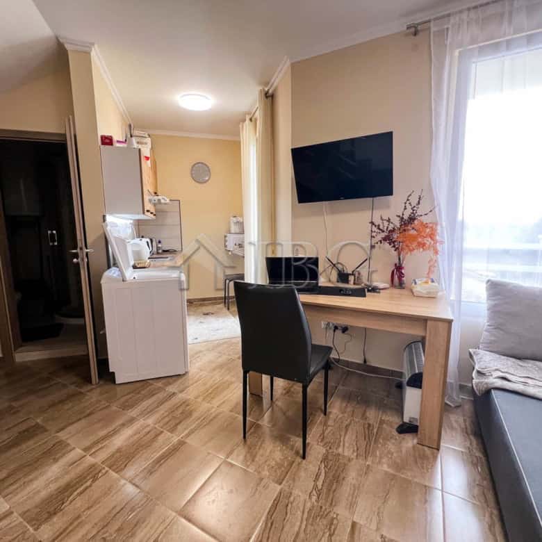 Apartment with pool view in Sunny Beach, Bulgaria, featuring a cozy bedroom, modern amenities, and a.
