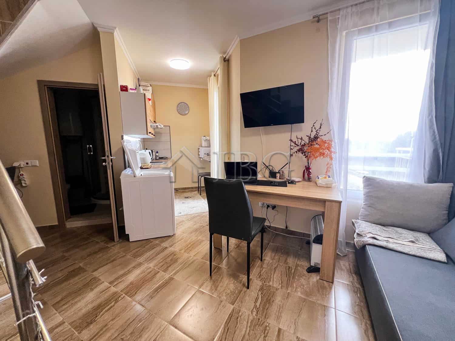 Apartment with pool view in Sunny Beach, Bulgaria, featuring a cozy bedroom, modern amenities, and a.