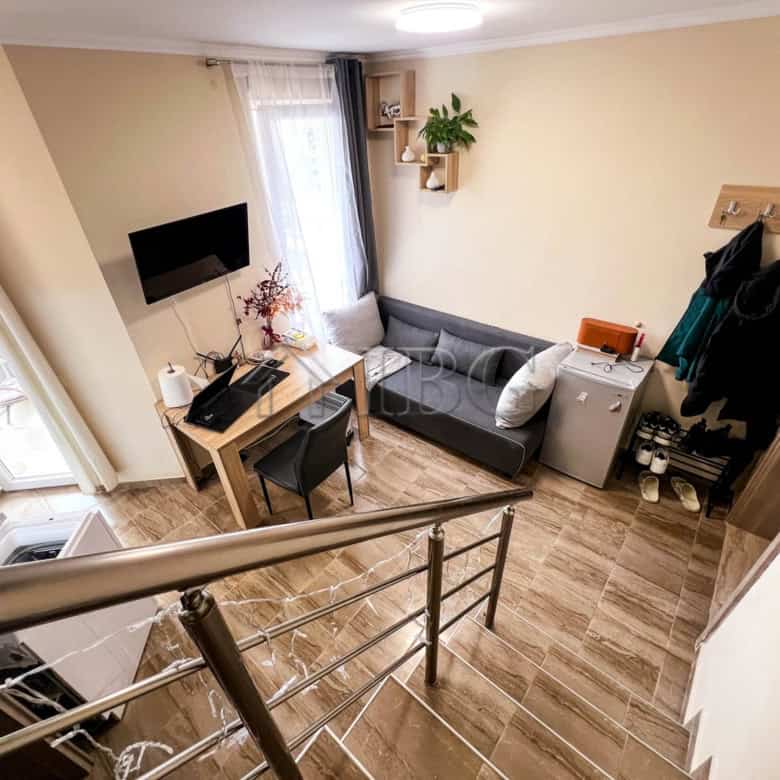Bright 1-bedroom apartment with pool view in Sunny Beach, featuring modern furnishings and a comfort.