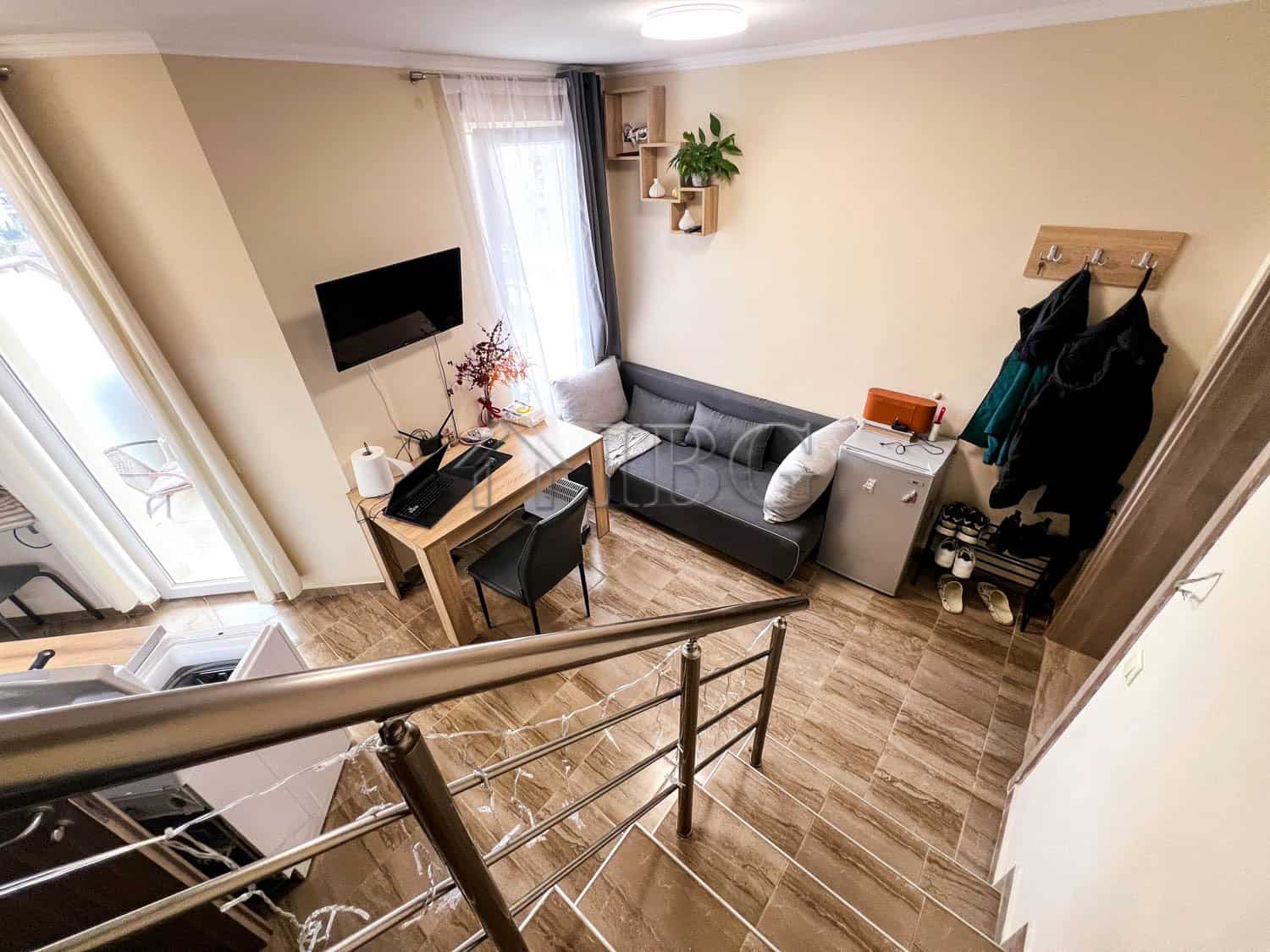 Bright 1-bedroom apartment with pool view in Sunny Beach, featuring modern furnishings and a comfort.