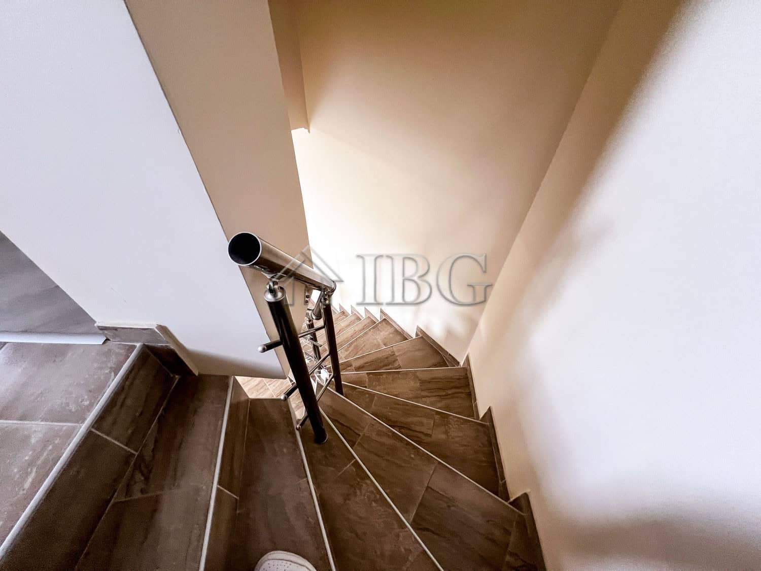 Bright staircase in a duplex apartment with pool view in Sunny Beach.