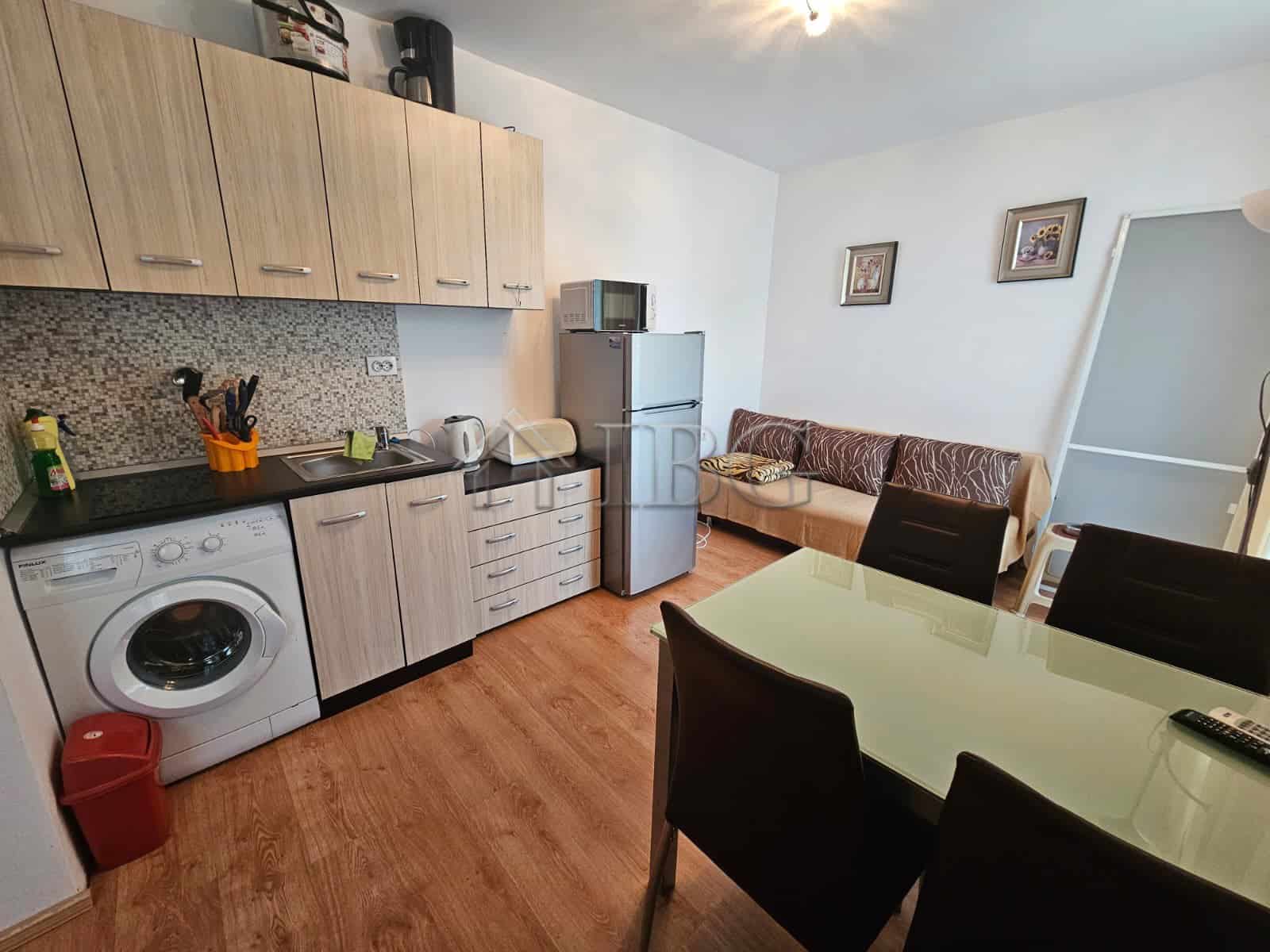 Bright 1-bedroom apartment in Gerber 4 Residence, Sunny Beach, Bulgaria. Modern kitchen, dining area.