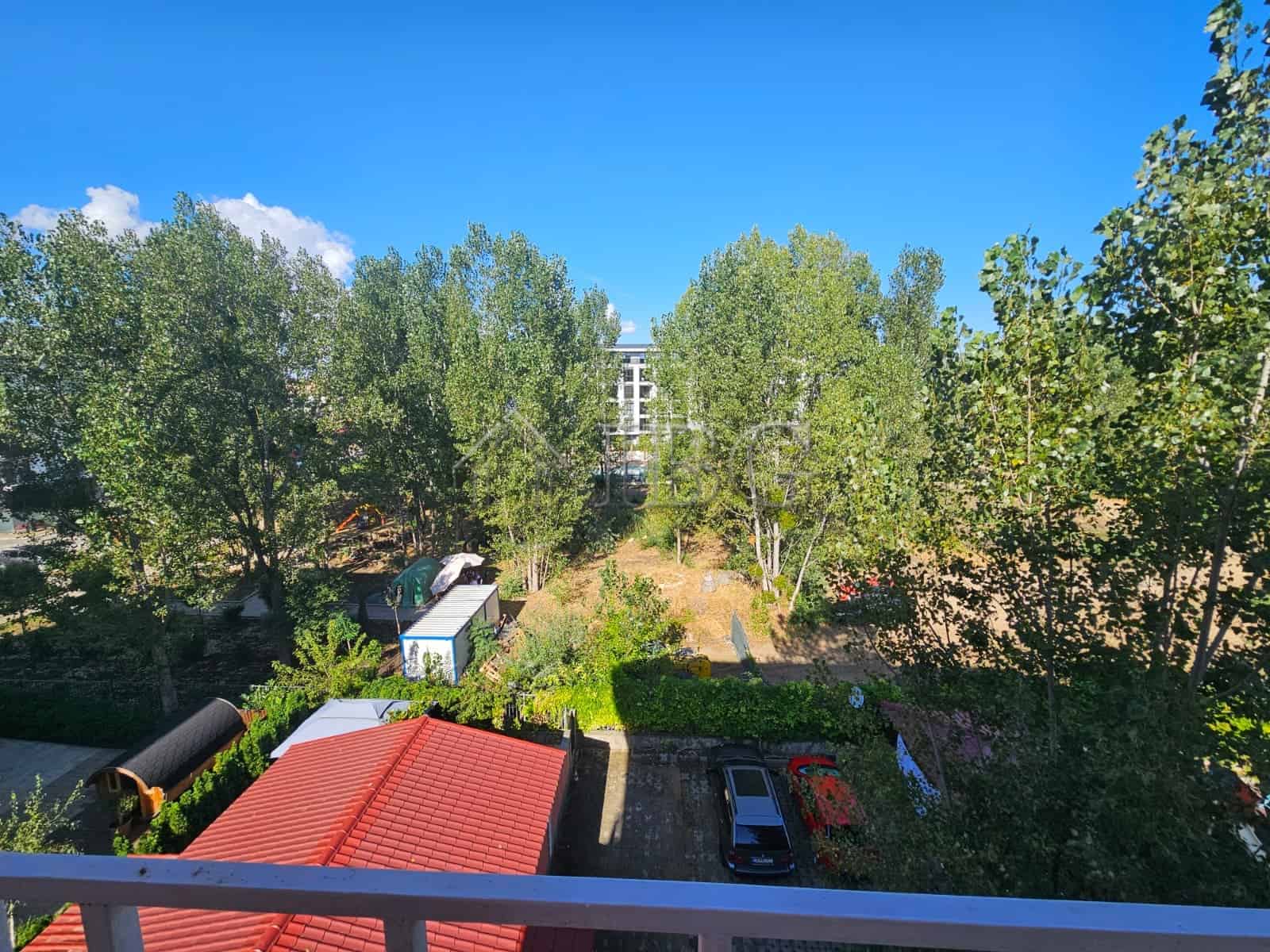 Bright 1-bedroom apartment in Gerber 4 Residence, Sunny Beach, with lush greenery and parking.