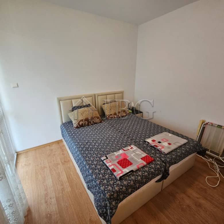Bright 1-bedroom apartment in Gerber 4 Residence, Sunny Beach, with simple decor and wooden flooring.