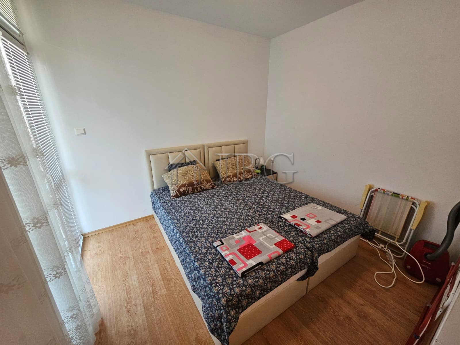 Bright 1-bedroom apartment in Gerber 4 Residence, Sunny Beach, with simple decor and wooden flooring.