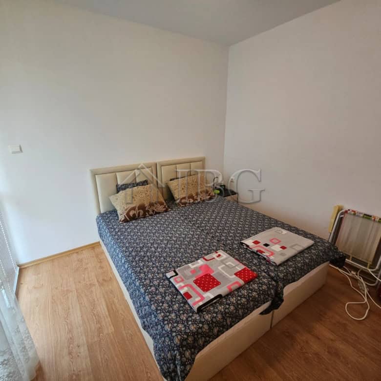 Apartment in Gerber 4 Residence, Sunny Beach, Bulgaria, with a cozy bedroom and essential amenities.