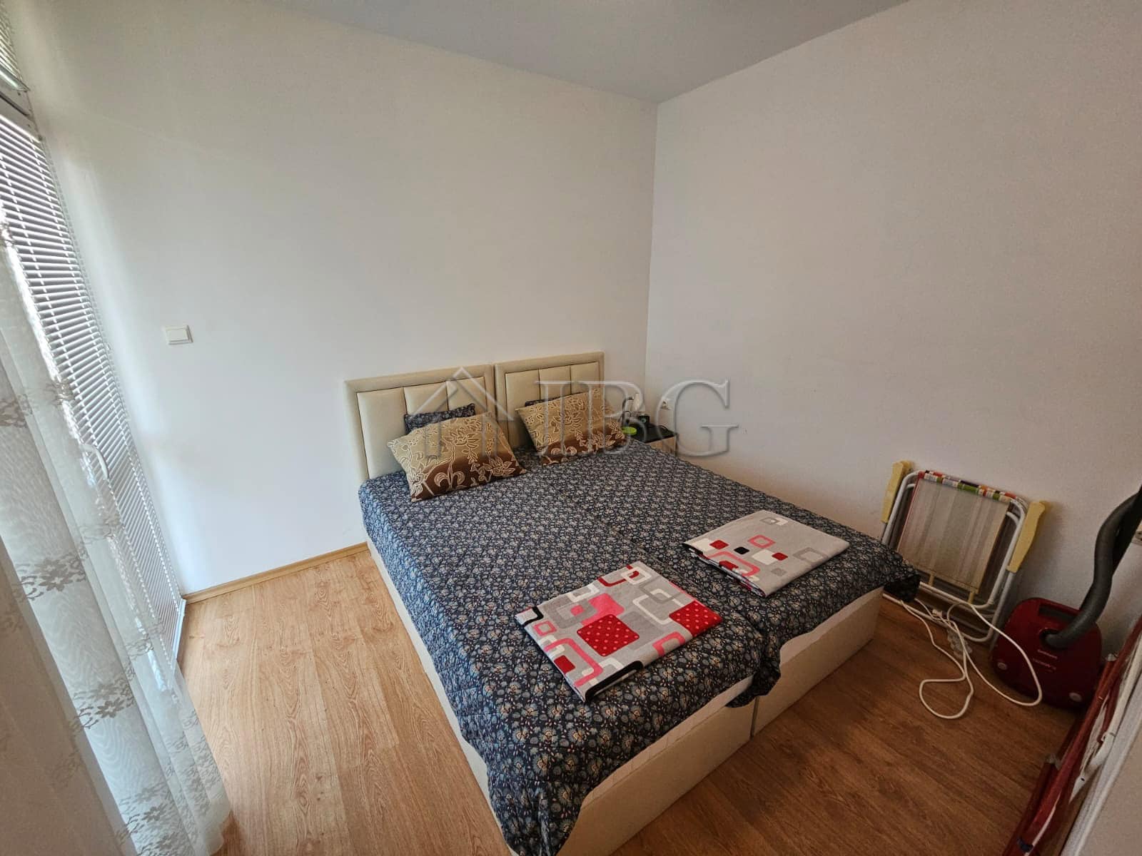 Apartment in Gerber 4 Residence, Sunny Beach, Bulgaria, with a cozy bedroom and essential amenities.