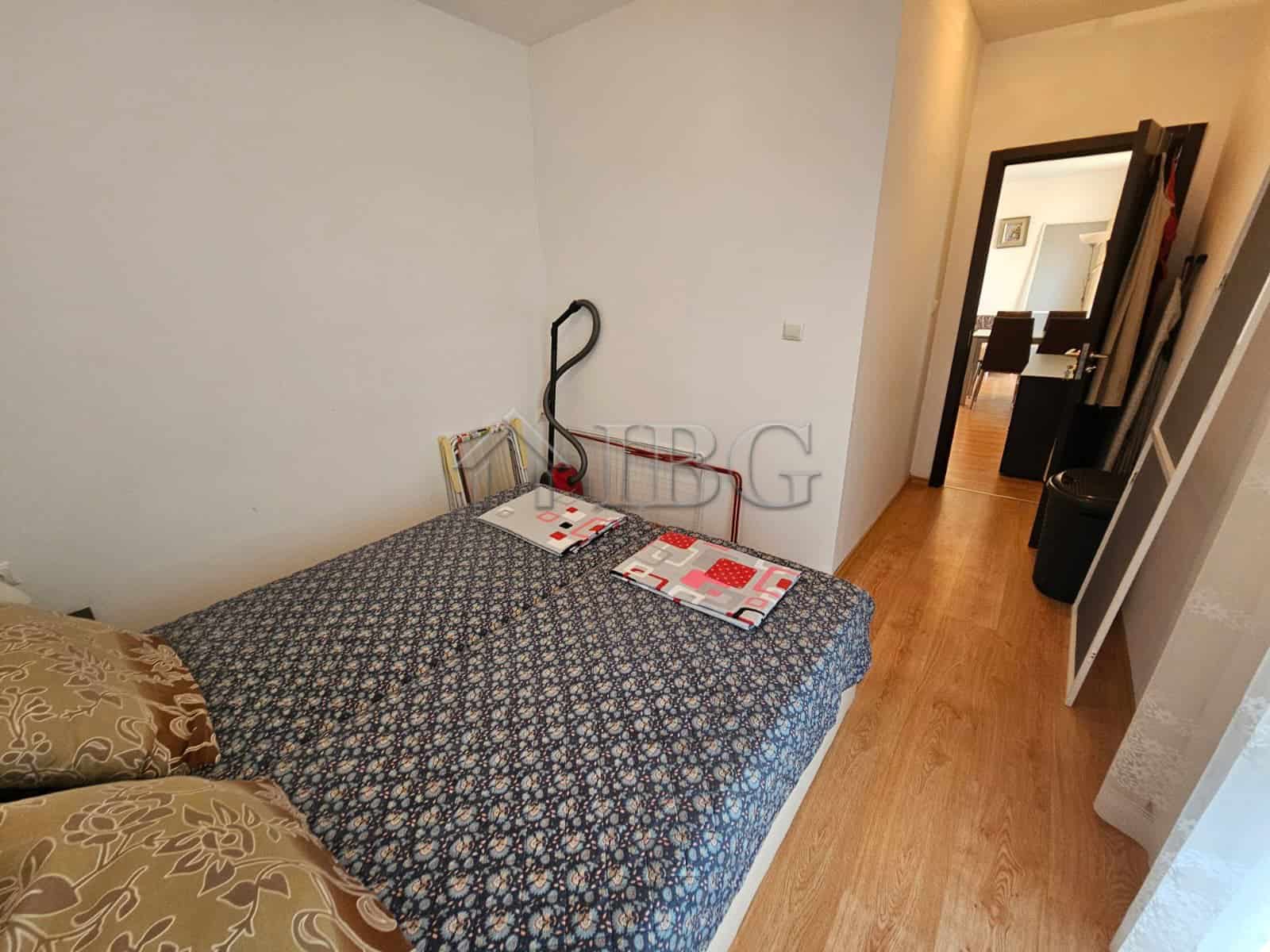 Bright bedroom with double bed and modern decor in Sunny Beach.