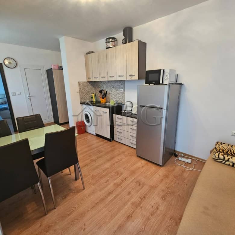 Bright interior of a 1-bedroom apartment in Gerber 4 Residence, Sunny Beach. Modern kitchen and livi.