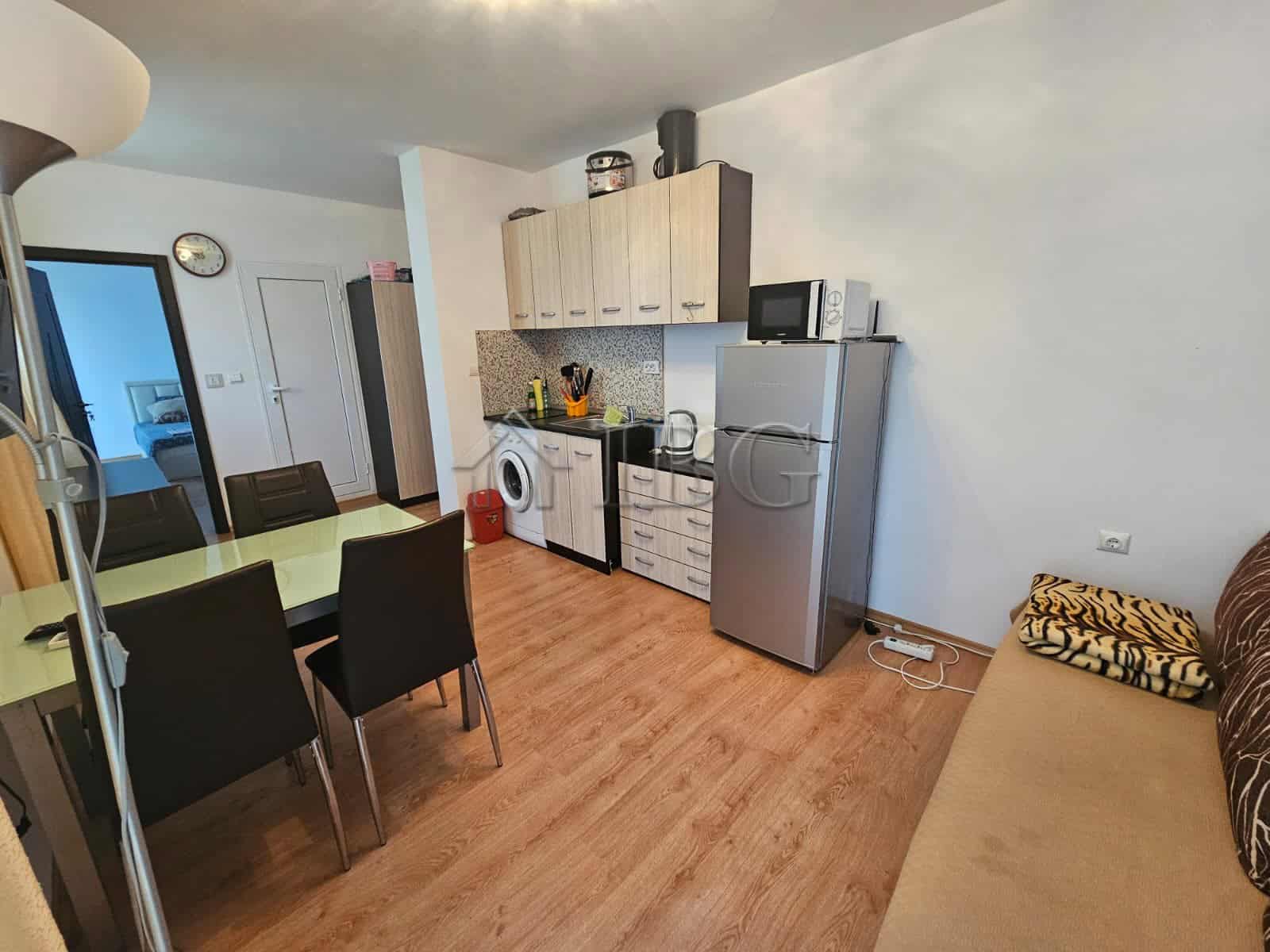 Bright interior of a 1-bedroom apartment in Gerber 4 Residence, Sunny Beach. Modern kitchen and livi.