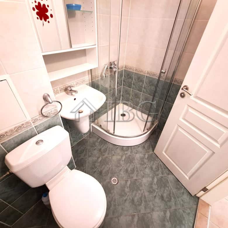 Bright bathroom with shower cabin in a spacious 2-bedroom apartment, Breeze complex, Sunny Beach.