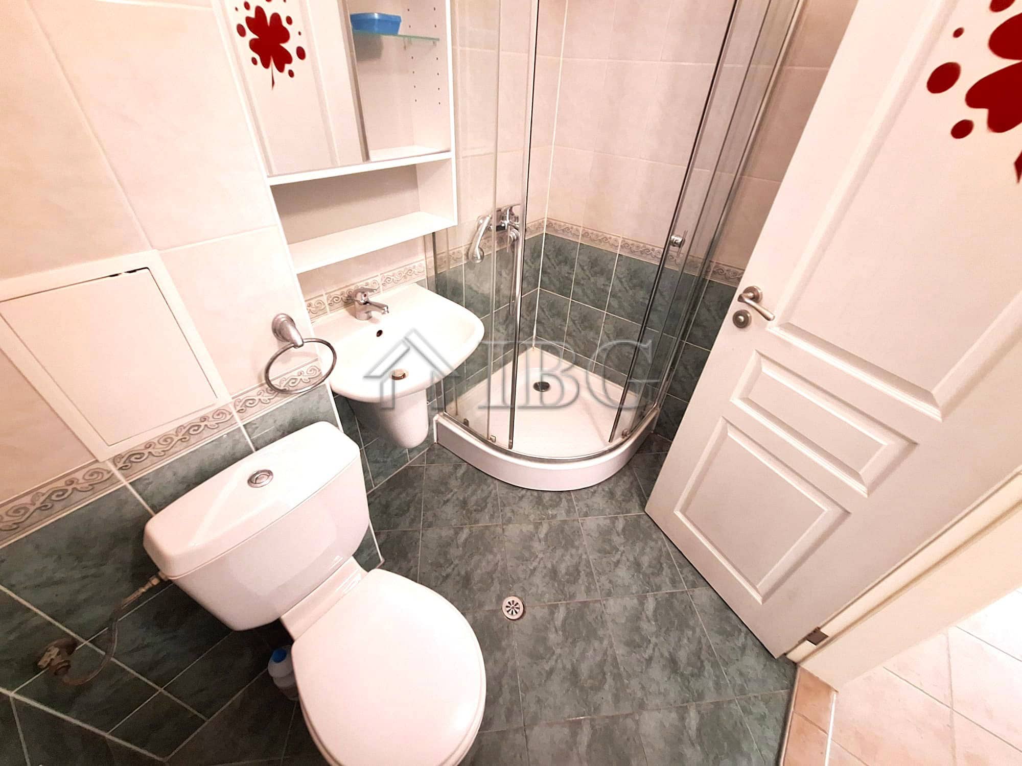 Bright bathroom with shower cabin in a spacious 2-bedroom apartment, Breeze complex, Sunny Beach.