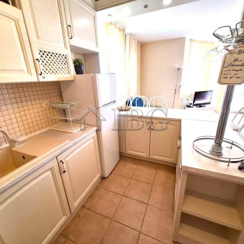 Bright kitchen with modern appliances and ample natural light in Breeze complex, Sunny Beach.