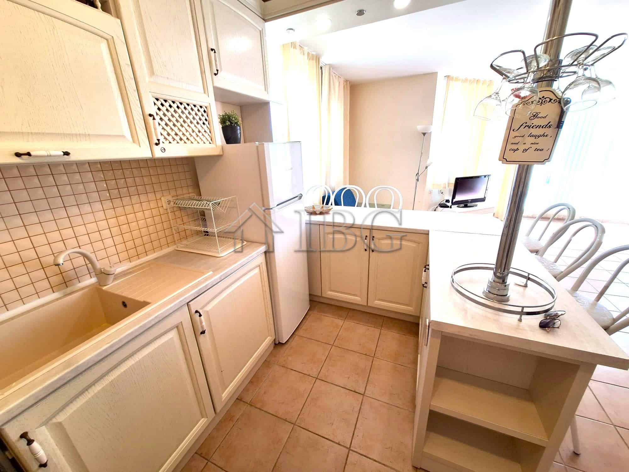 Bright kitchen with modern appliances and ample natural light in Breeze complex, Sunny Beach.
