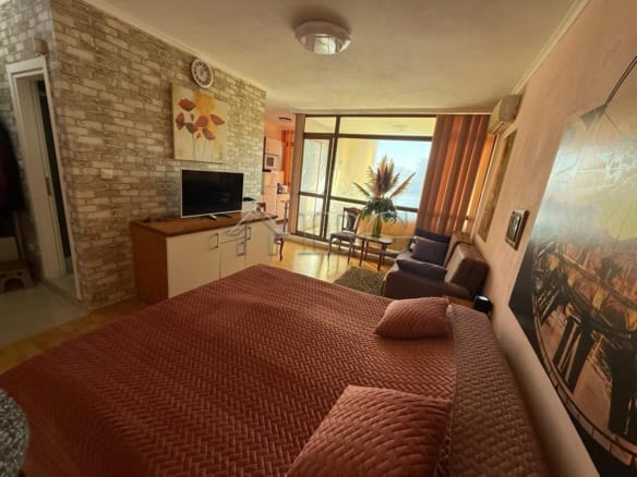 Modern studio apartment with balcony, sea view, and bright interior in Sun City 1, Sunny Beach.