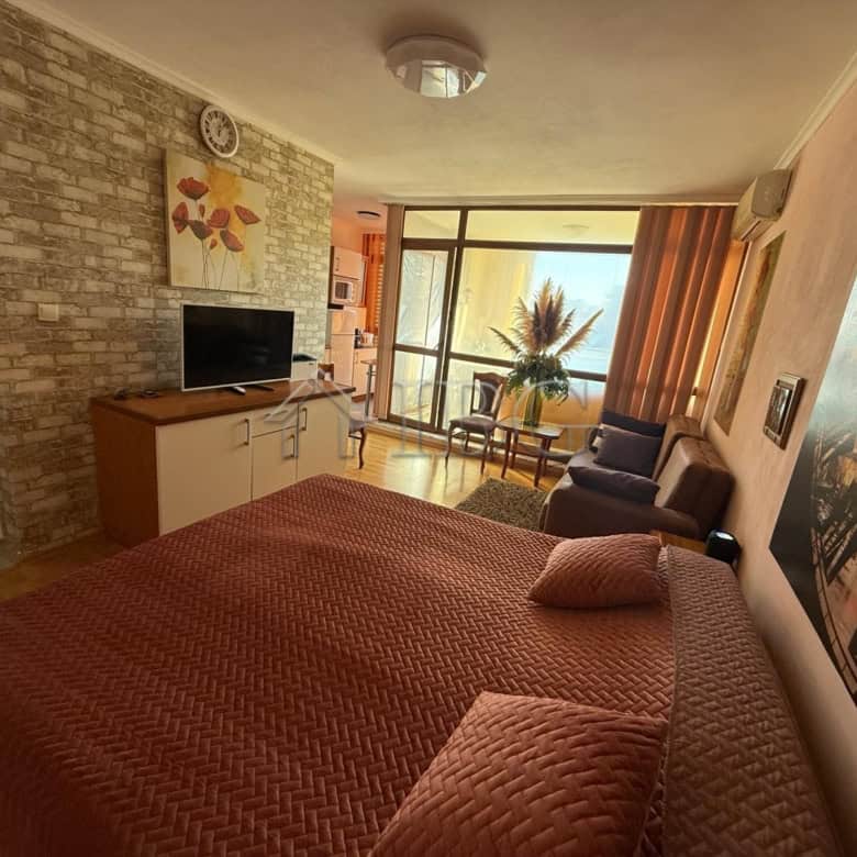 Modern studio apartment with balcony, sea view, and bright interior in Sun City 1, Sunny Beach.