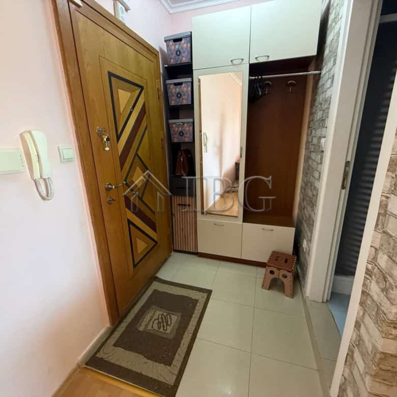 Spacious studio apartment with balcony for sale in Sun City 1, Sunny Beach, featuring modern interio.