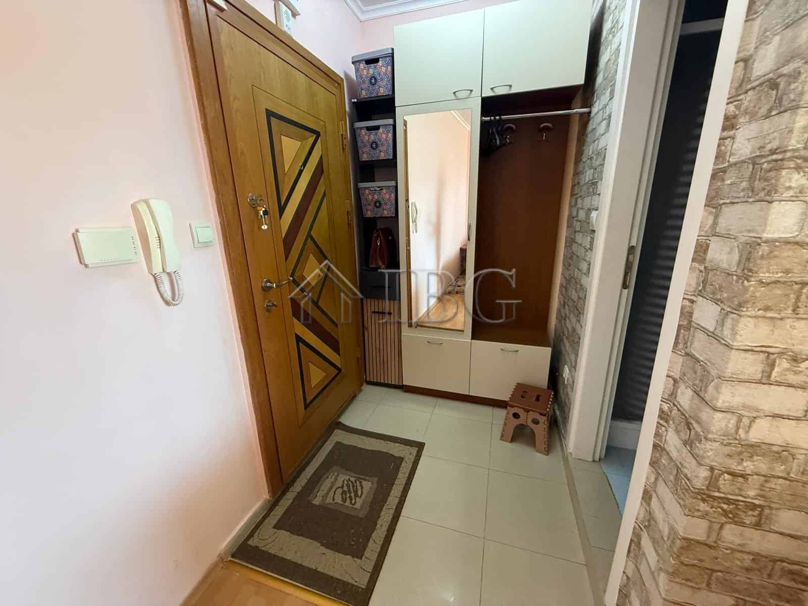 Spacious studio apartment with balcony for sale in Sun City 1, Sunny Beach, featuring modern interio.