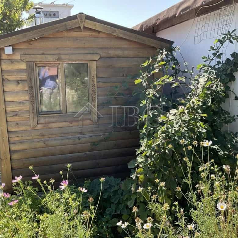 Renovated 3-bedroom house just 5 km from the sea in Kamenar district, Pomorie, with a garden and out.