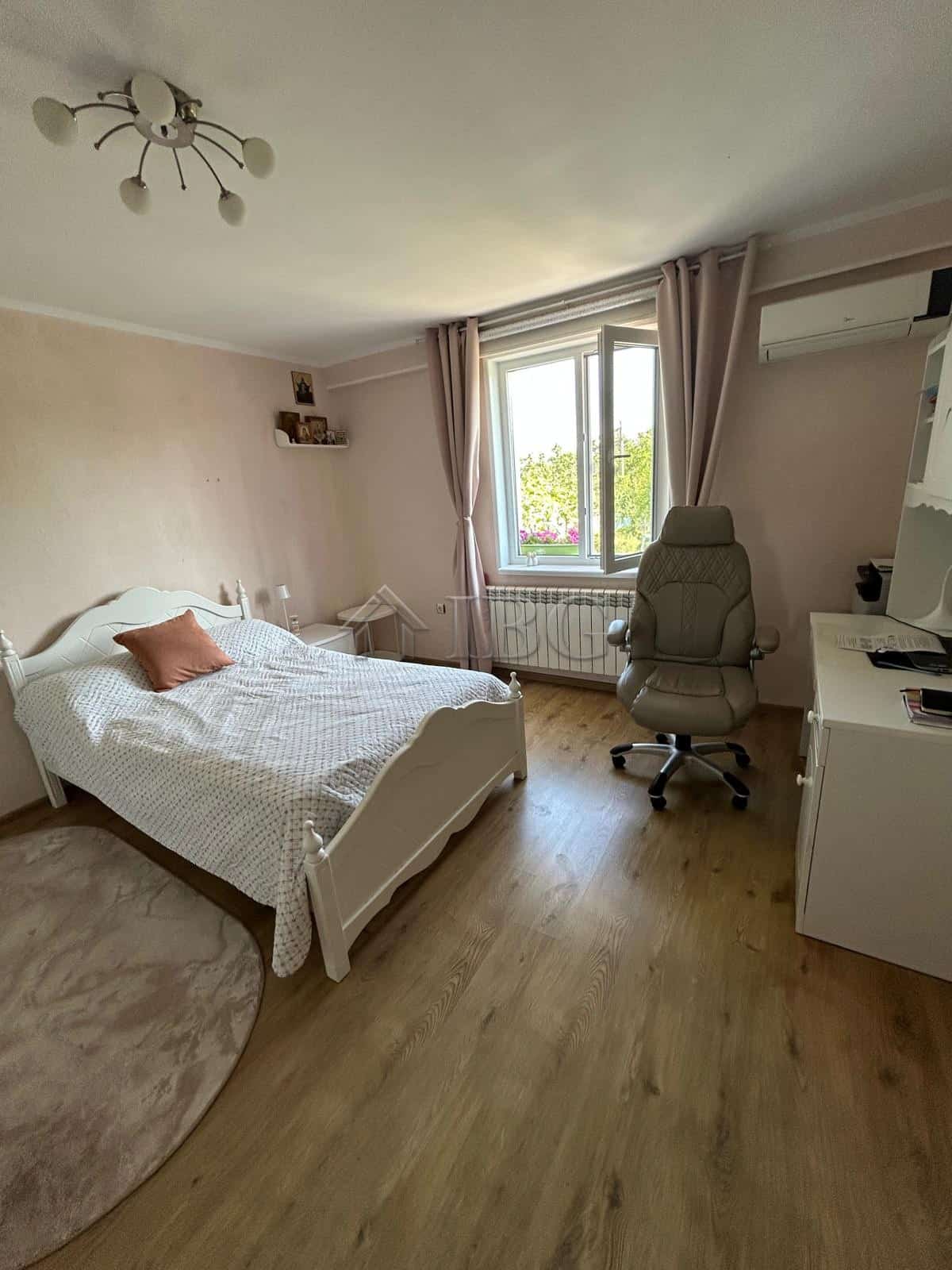Bright bedroom with modern furnishings in a renovated house close to the sea in Pomorie.