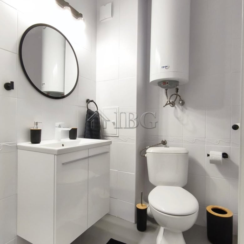 Furnished studio bathroom with modern fixtures and sea view balcony in Sveti Vlas.