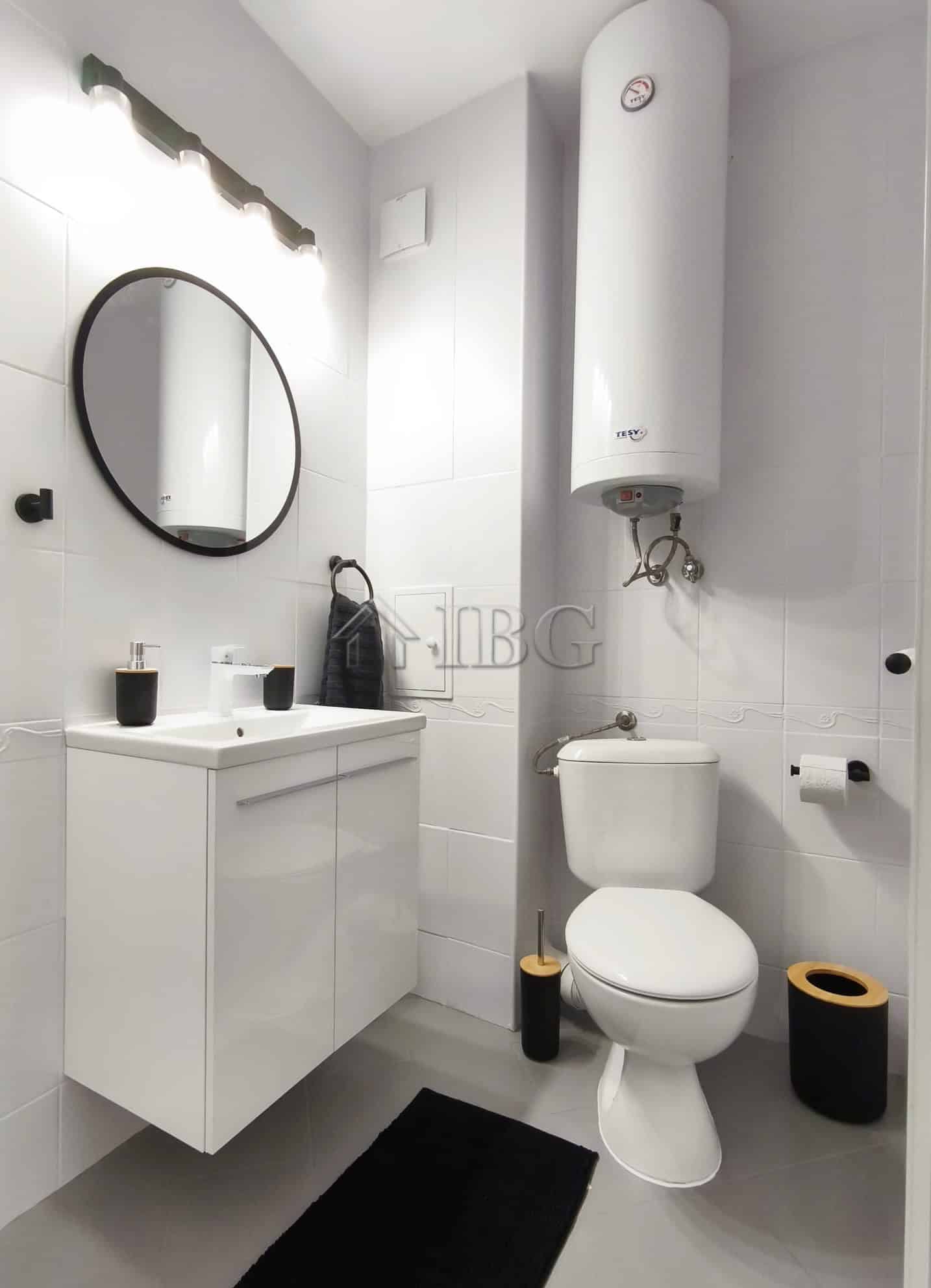 Furnished studio bathroom with modern fixtures and sea view balcony in Sveti Vlas.