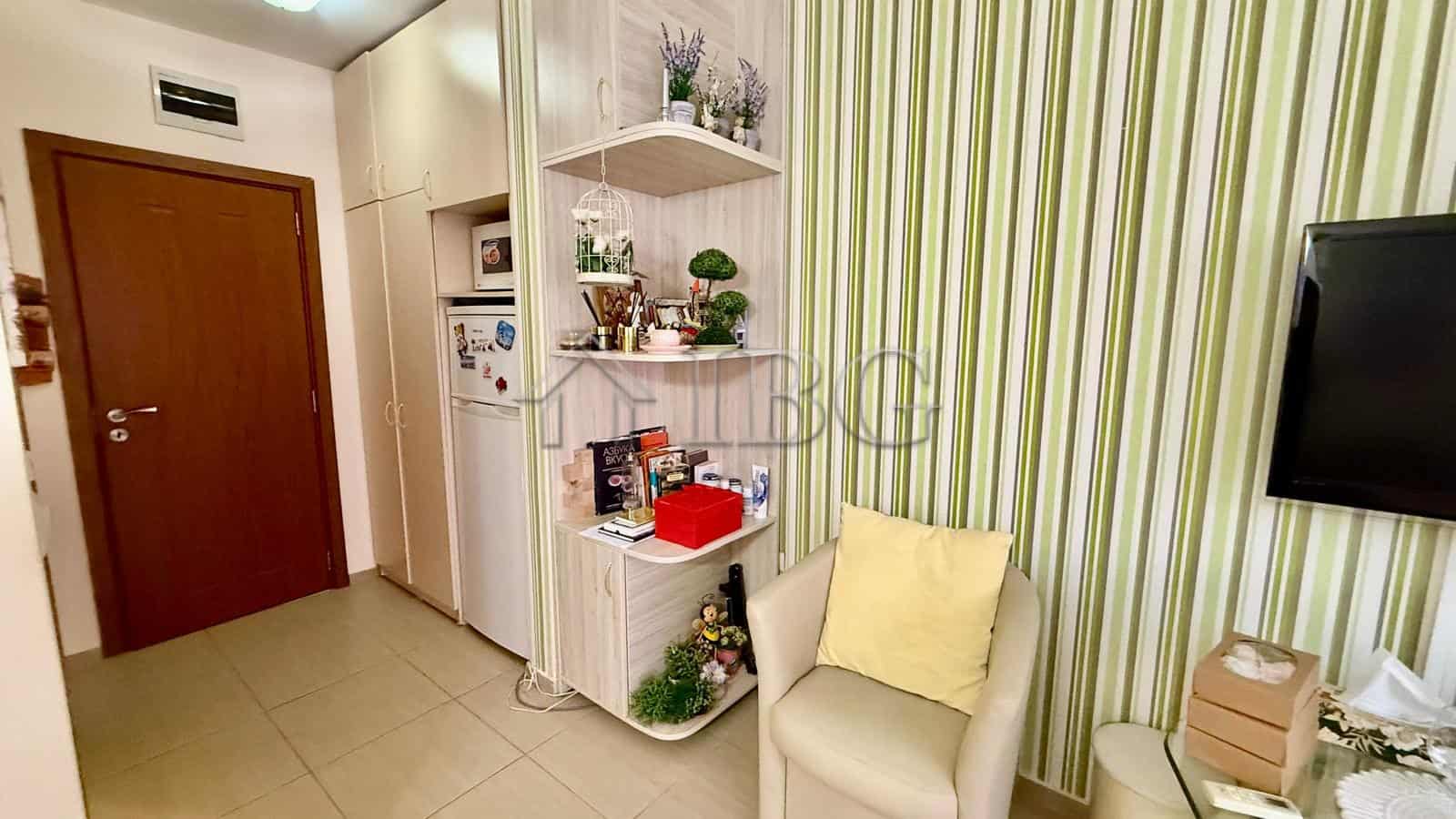 Bright 2-bedroom apartment with direct beach access in Nessebar, featuring modern decor and cozy sea.