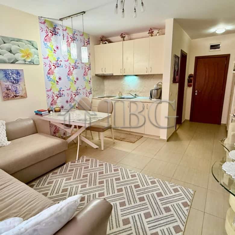 Bright living room in a 2-bedroom apartment near the beach in Nessebar. Modern decor, cozy seating,.