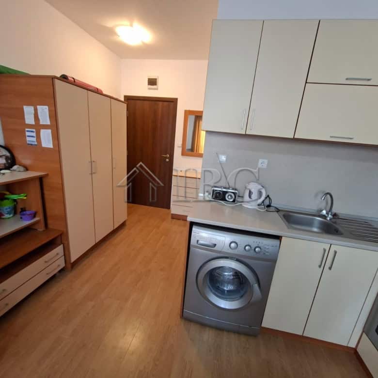 Furnished studio apartment kitchen with modern appliances in Sunny Beach, Bulgaria. Perfect for comf.