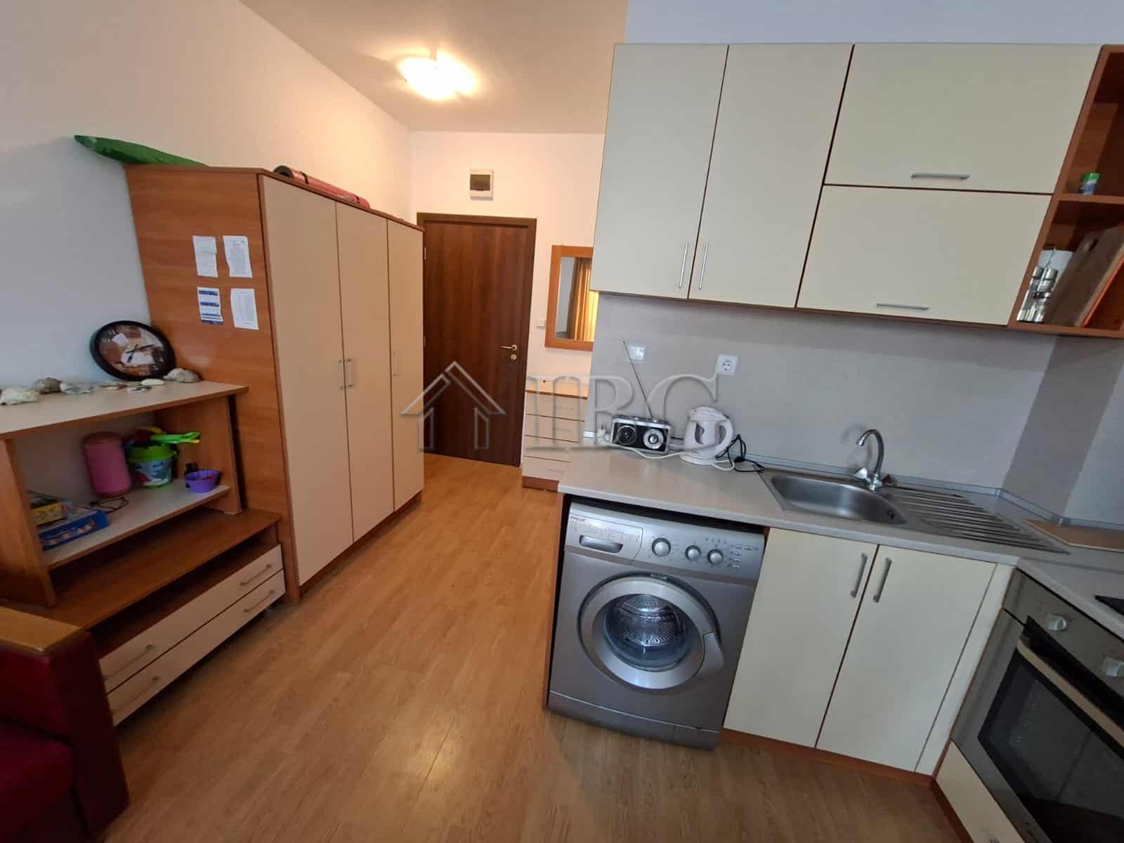 Furnished studio apartment kitchen with modern appliances in Sunny Beach, Bulgaria. Perfect for comf.