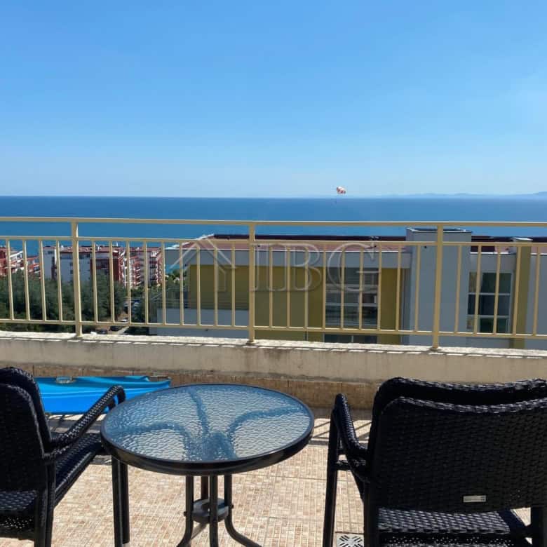 Sea view studio apartment at Crown Fort Club with balcony overlooking the ocean.