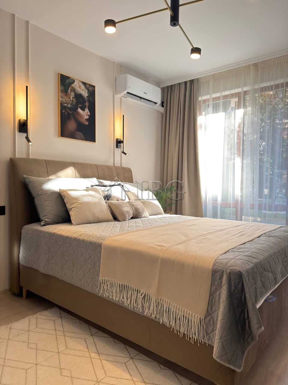 Cozy bedroom in Panorama Bay 2 with modern decor and natural light. Perfect for a relaxing stay in S.