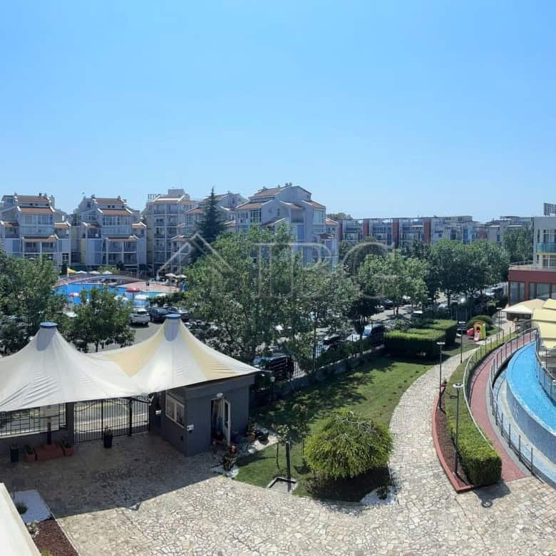Modern 1-bedroom apartment overlooking a scenic pool in Sunny Beach, Cacao Beach.