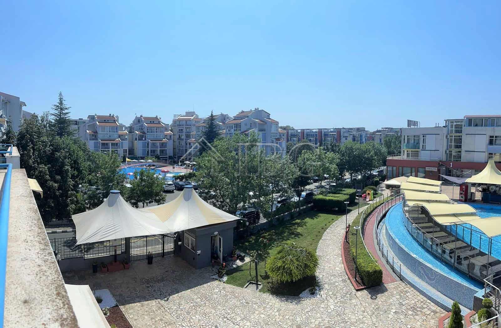 Modern 1-bedroom apartment overlooking a scenic pool in Sunny Beach, Cacao Beach.