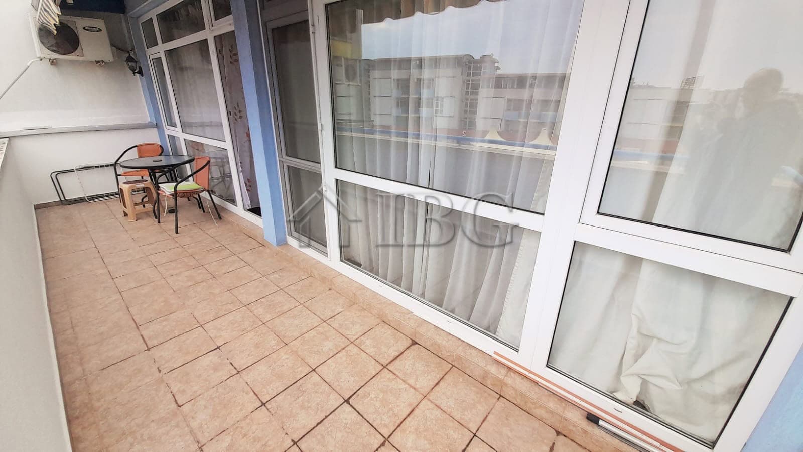 Bright balcony with pool view in Sunny Beach, Cacao Beach.