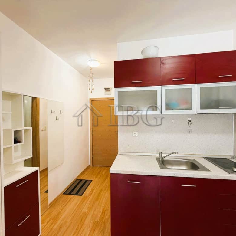 Bright 2-bedroom apartment overlooking park and tennis court, sunny day at Sunny Beach.