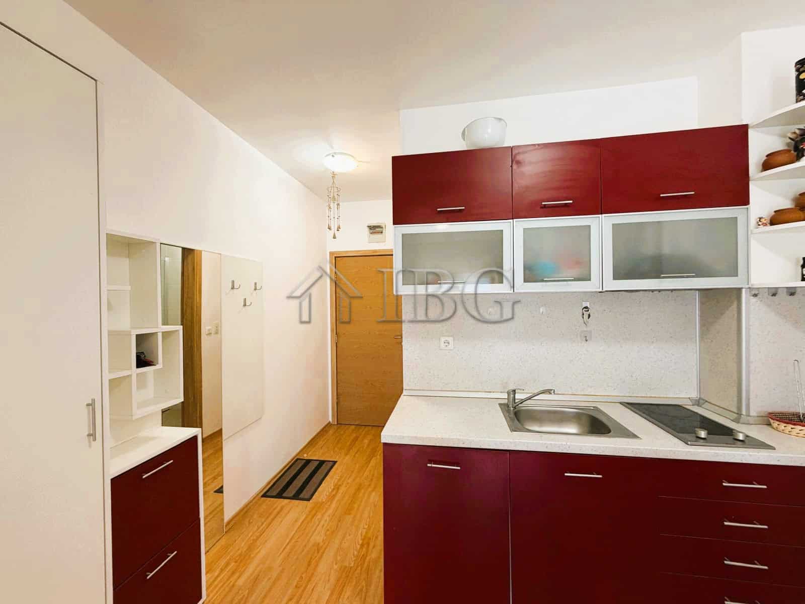 Bright 2-bedroom apartment overlooking park and tennis court, sunny day at Sunny Beach.