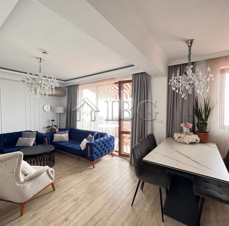 Bright living room with panoramic sea views and elegant decor.