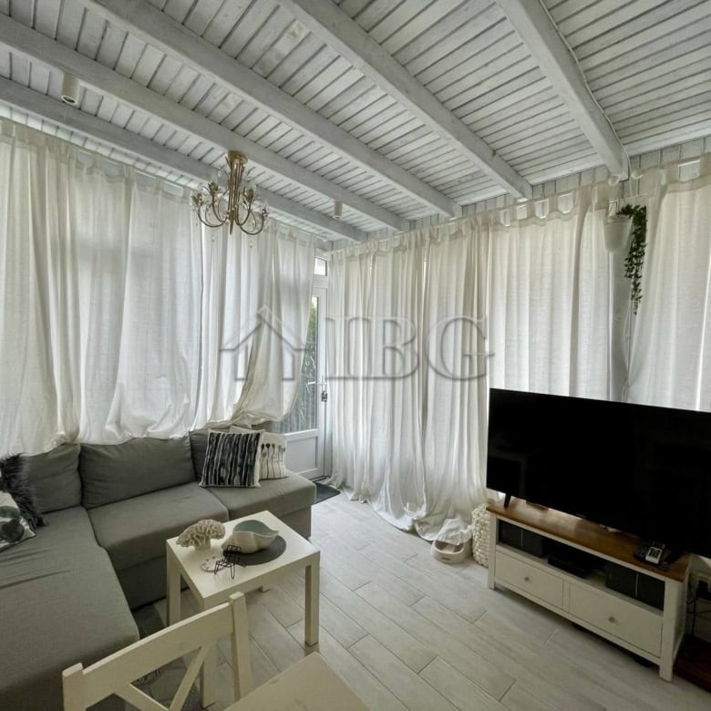 Bright living room with white curtains and modern furniture in Sun Gate, Sunny Beach.