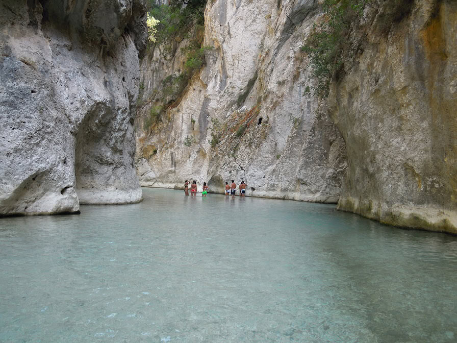 Plot of land for sale in Vitsa Zagori Greece with scenic river views and natural surroundings.