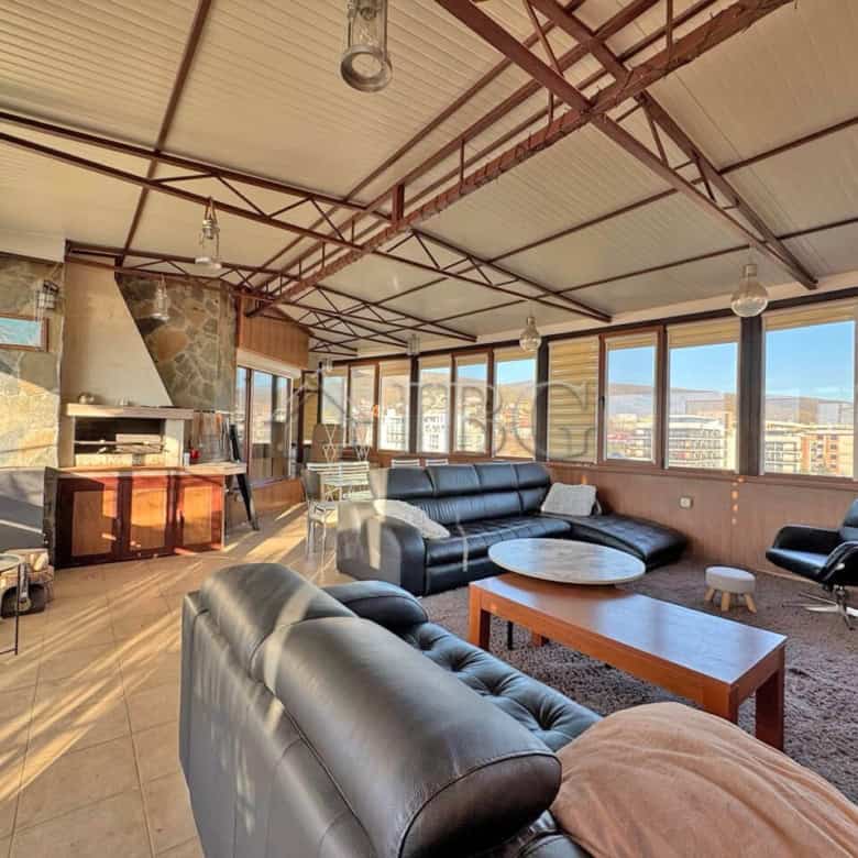 Bright living room with large windows and modern furniture in Sveti Vlas.