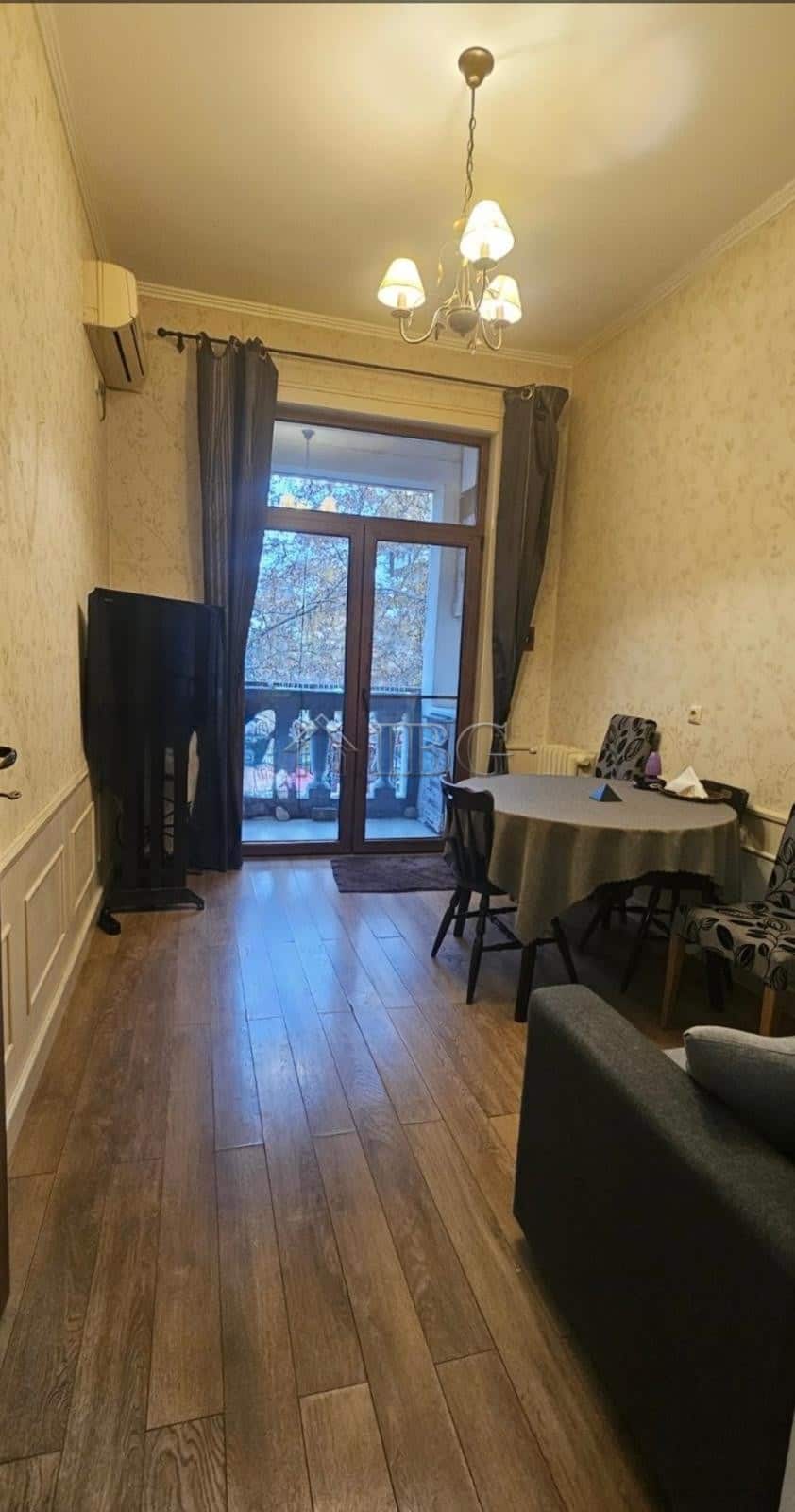 Bright living room with balcony access in Ruse's top center.