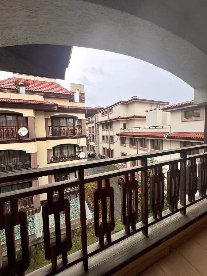Balcony view of residential buildings in Sveti Vlas, Bulgaria, with a glimpse of the sea in the back.