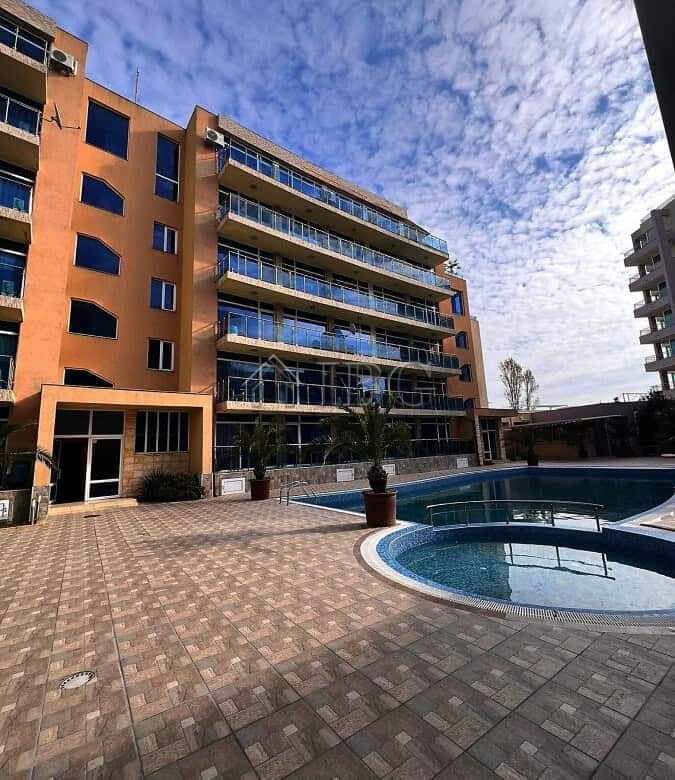 Modern 2-bedroom apartment with pool and partial sea view in Sunny Beach's Gallery 2 complex.