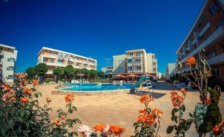 Furnished studio with balcony overlooking park in Nessebar Fort Club, Sunny Beach. Modern amenities.